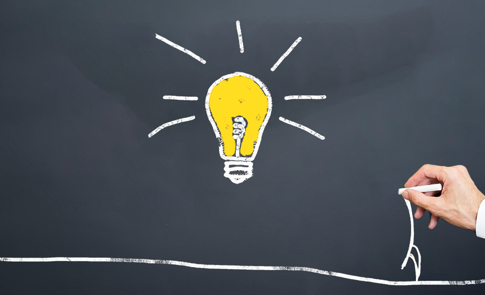 Lightbulb sketch on chalkboard representing the discovery phase